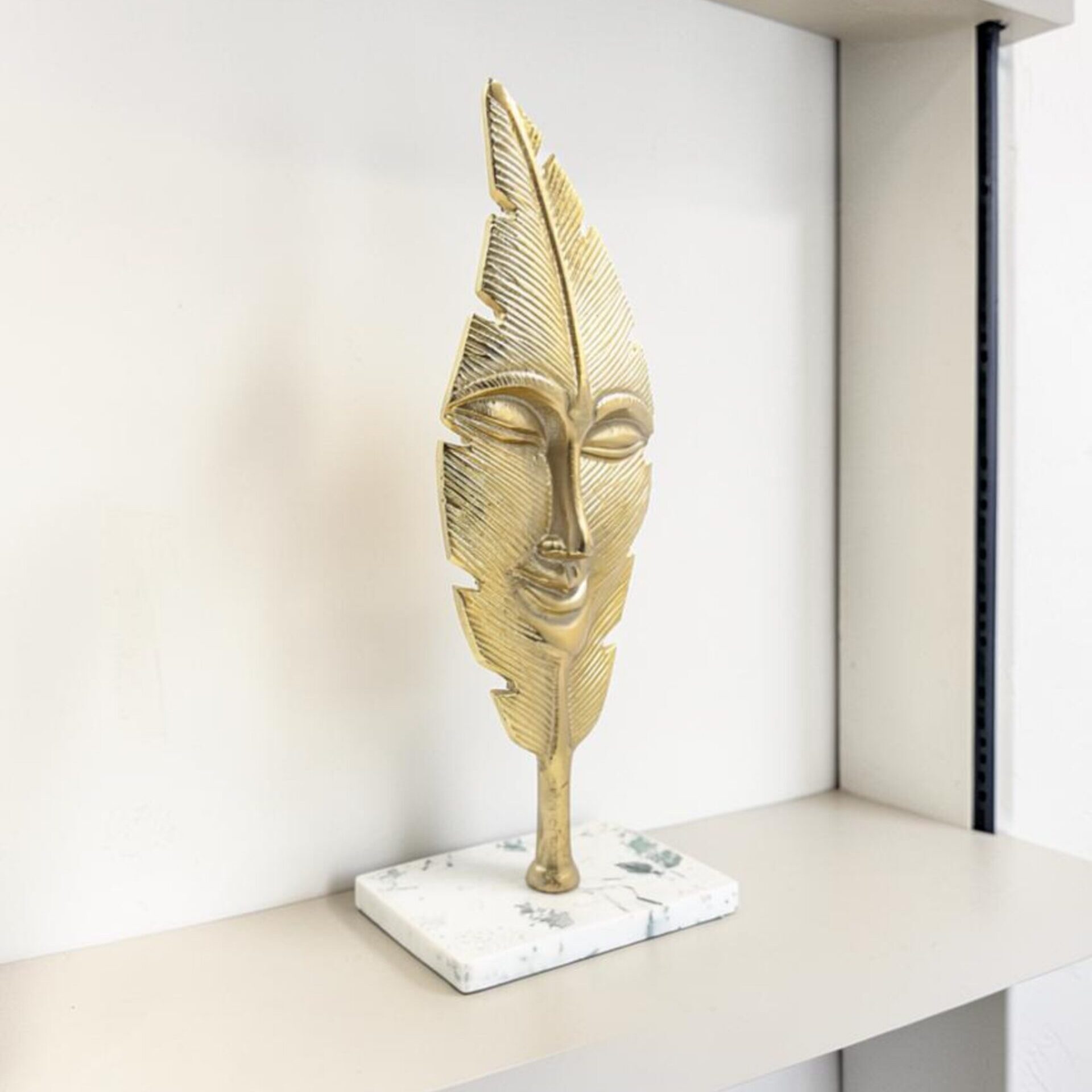 metal figurine 33 facelead lifestyle